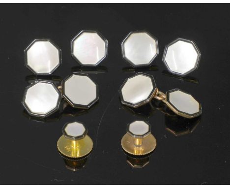 A cased mother-of-pearl dress set, with a pair of chain link cufflinks, each face an octagonal mother-of-pearl plaque with bl