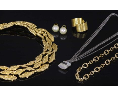 A Givenchy three row leaf collar, of curved form with a concealed box clasp, together with a Christian Dior polished and Flor