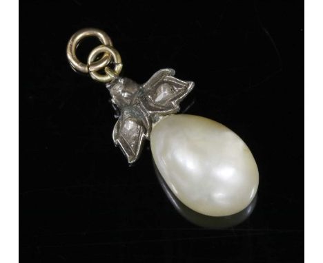 A Georgian natural pearl and diamond pendant, with a pear-shaped pearl, 15.4 x 11.2 x 10.6mm, peg set to a silver leaf spray.