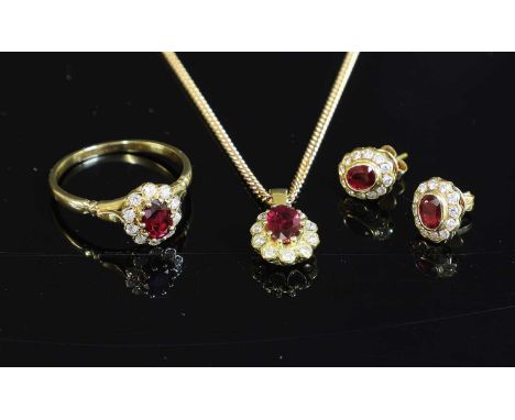 A gold ruby and diamond cluster pendant necklace, earring and ring matched suite, the necklace with an oval mixed cut ruby cl