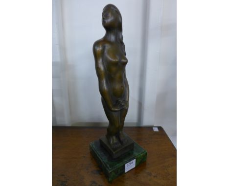 A bronze abstract figure of a lady