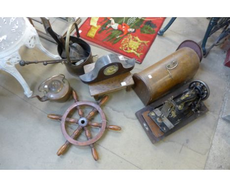 A Pfaff sewing machine, small ship's wheel, oak stool, mantel clock and copper kettle, etc.