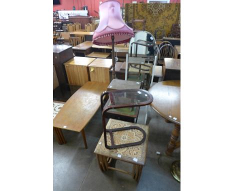 A G-Plan nest of tables, cheval mirror, standard lamp and occasional tables