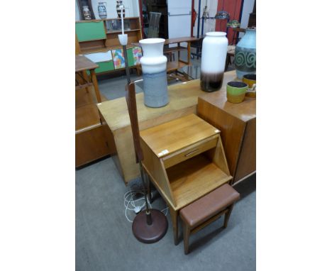 A Chippy teak telephone seat and standard lamp