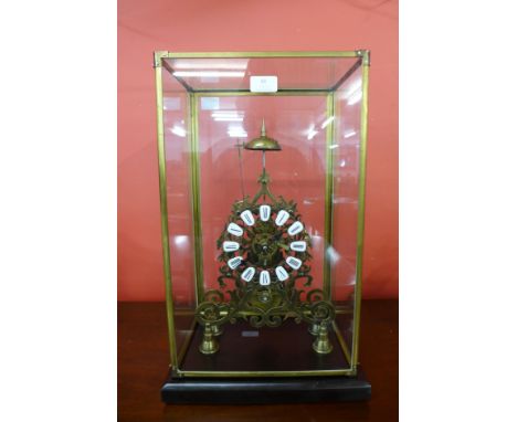 A gilt metal fusee skeleton clock 