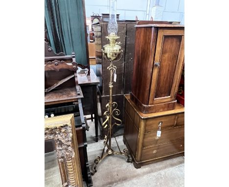 A late Victorian painted wrought iron telescopic oil lamp standard