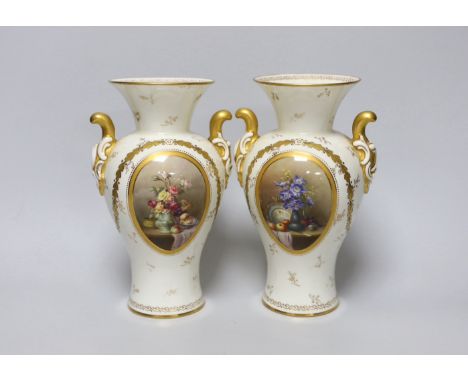 A pair of Royal Worcester vases with gilded decoration and still life panels signed W A Hawkins, each 21cm high