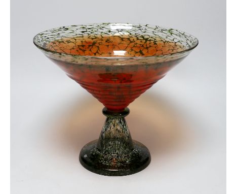 A Kosta Boda orange and green glass pedestal bowl, signed KOSTA BODA / K. ENGMAN 7050647, 26cm high