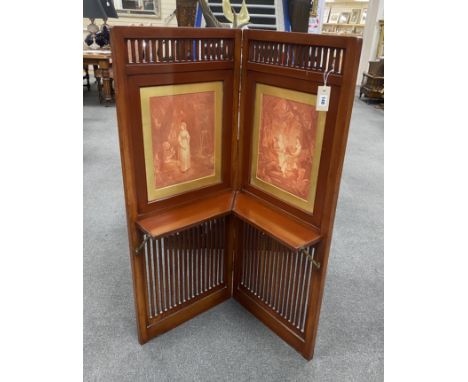 An Edwardian mahogany two fold screen, each panel width 46cm, height 117cm