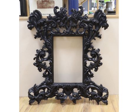 A large black painted gothic style picture frame, aperture 42.5cm x 27cm