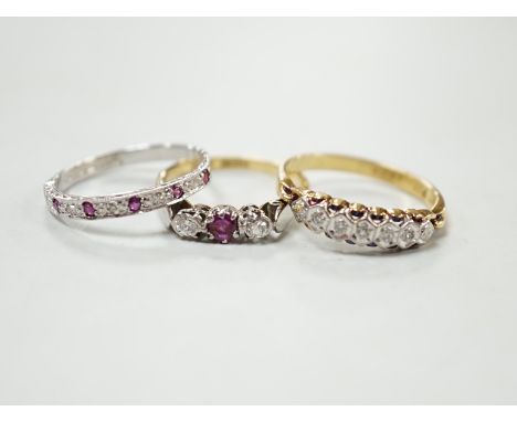 A modern 18ct gold, ruby and diamond chip set half eternity ring, size O and two 18ct &amp; plat rings including illusion set