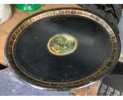 A Victorian toleware tray with transfer cartouche of children playing with model boats, width 60cm