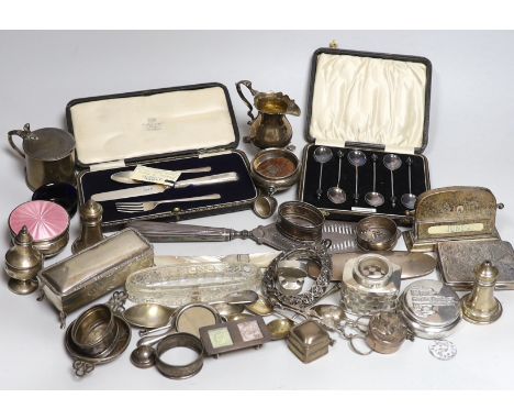 A group of assorted minor silver, including cased coffee spoons, christening trio, Georgian silver cream jug, cigarette case,