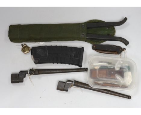 Two bayonets for Enfield No 4, M16 rifle magazine, WWI trench knife and lighter, rifle bi-pod and collection of nine folding 