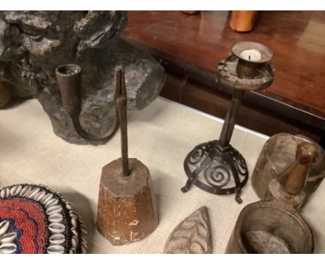 An 18th century rushlight and a wrought iron candlestick, rush light 26cm high