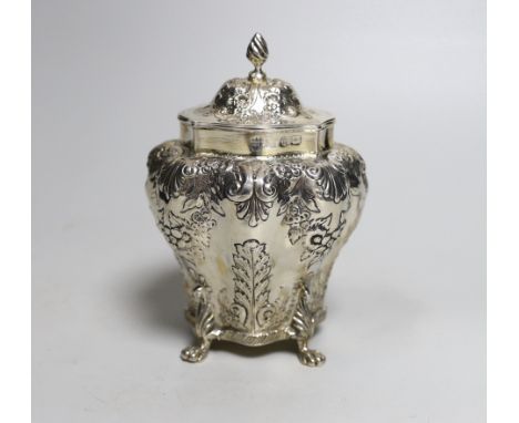 A late Victorian embossed silver bombe shaped tea caddy, Nathan &amp; Hayes, Birmingham, 1894, 14.3cm, 8.4oz.