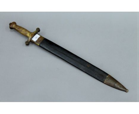 A 19th century brass handled sword in scabbard. 65 cm long.