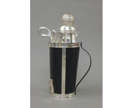 A silver plate golf caddy formed cocktail shaker. 32 cm high.