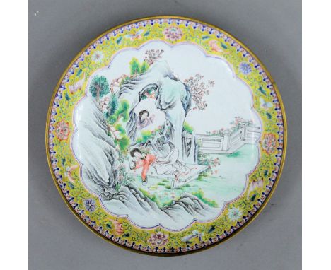 A late 19th/early 20th century Canton yellow ground enamel plate. 27 cm diameter.