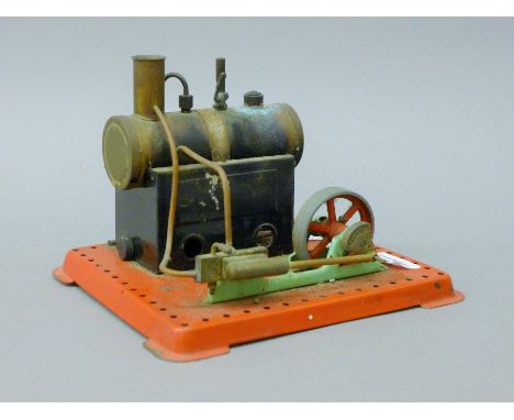 A Mamod stationery steam engine. 20 cm long.