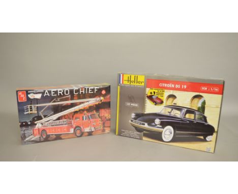 Two plastic model kits: Heller Citroen DS 19 1:16 scale; AMT 980/06 American LaFrance 1000 Series Aero Chief. Both sealed. (2