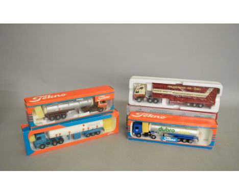 Three boxed Tekno 1:50 scale diecast model trucks including two Scania tractor units and a Volvo, all with tanker trailers, t