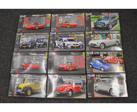 Twelve Revell plastic model kits, all 1:24 scale cars, including BMW, Corvette, VW Beetles, etc. Boxed, ex-shop stock.