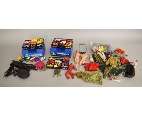 Mixed lot containing; a selection of Palitoy Action man clothing and accessories with two part figures and two matchbox carry