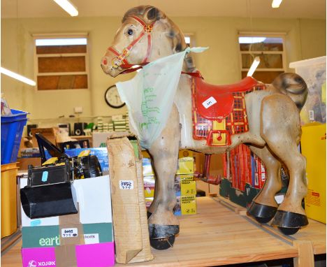 A varied selection of mainly unboxed vintage toys including a Mobo (Sebel Products) 'Bronco'  pressed steel Horse on wheels i