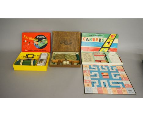 Three games including Escalado by Chad Valley, Careers by John Waddington Ltd and  a vintage Table Tennis Set, all boxed 