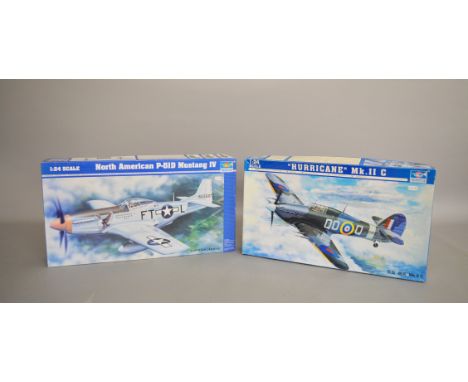 Two Trumpeter 1:24 scale plastic model kits, both aircraft: 02415 'Hurricane' Mk.II C; 02401 North American P-51D Mustang IV.