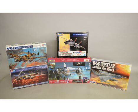 Five plastic model kits, all 1:48 scale aircraft: Revell 05753 B-25J Mitchell; Monogram 85-5713 B-58 Hustler; Tamiya 61105.64