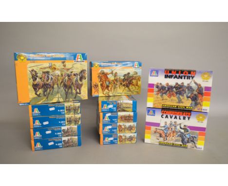 Twelve  Italeri 1:32 scale plastic figure sets. Boxed and complete.