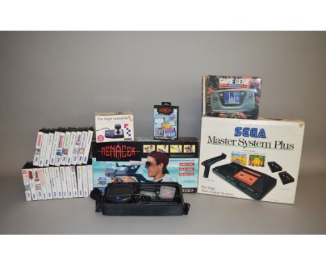 A selection of vintage Gaming Equipment including a boxed Sega Master System Plus Video Games Console and twenty three games 