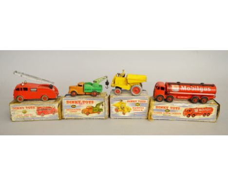 Four boxed Dinky Toys, 25x Breakdown Lorry, 555 Fire Engine, 941 Foden Tanker 'Mobilgas' and 962 Dumper Truck. Models appear 