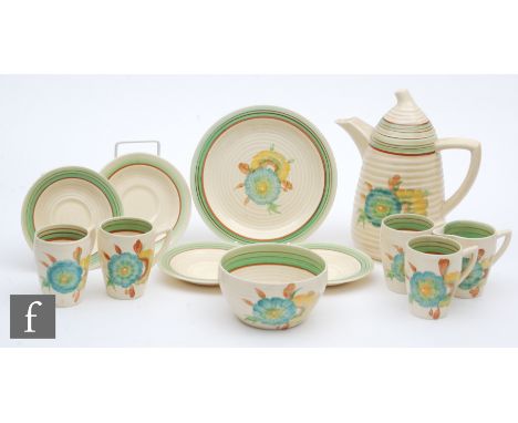 A Clarice Cliff Lynton shape coffee service circa 1936, comprising coffee pot, cream, sugar, four cans and saucers and a side