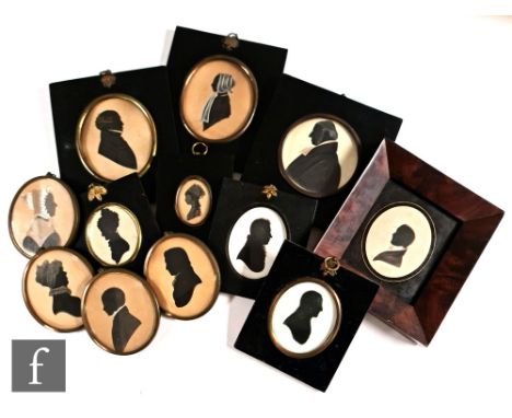 ENGLISH SCHOOL (MID 19TH CENTURY) - Portrait of a clergyman, a highlighted cut out silhouette, circular, framed, 9cm diameter