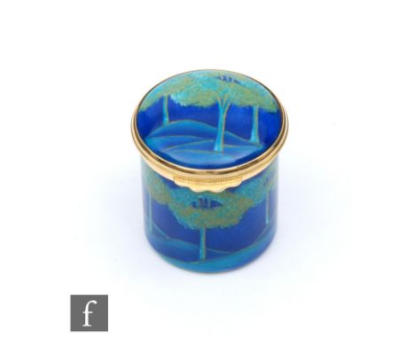 A boxed Moorcroft Enamel cylindrical pot and cover decorated in the Moonlit Blue pattern, printed mark, height 4.5cm. 