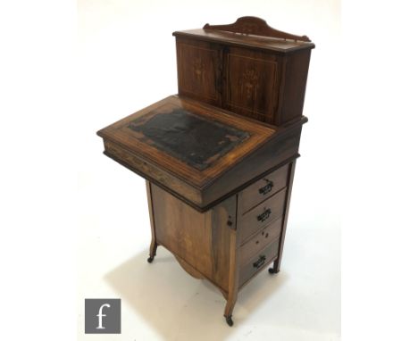 A Victorian inlaid walnut veneered piano top Davenport desk, the upright section with fitted interior above the fall front wr