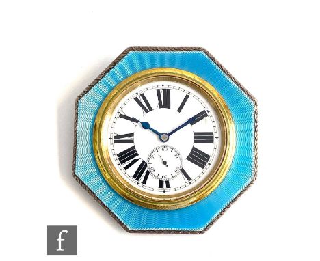 A hallmarked silver octagonal boudoir clock, Roman numerals to a white enamelled dial within a powder blue enamel decorated b