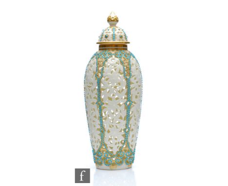 A 19th Century Grainger &amp; Co Worcester reticulated vase and cover with pierced panels of flowers with turquoise enamel je