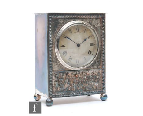 An Edwardian plated cased mantle clock by Edmund Crouch Worthing, circular matted centre over a frieze embossed with dancing 