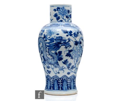 A Chinese blue and white porcelain vase, late Qing Dynasty (1644-1912), of baluster form extending to a high neck, the body d