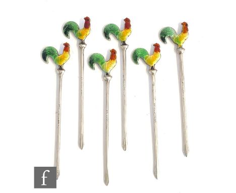 A set of six Sterling silver cocktail sticks each with an enamel cockerel to terminal. 