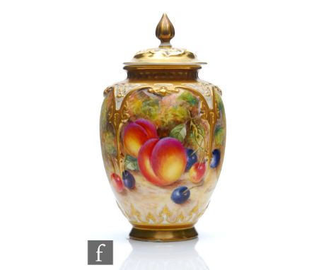 A Royal Worcester Fallen Fruits shape H169 vase and cover panel decorated by Freeman with hand painted peaches and cherries, 