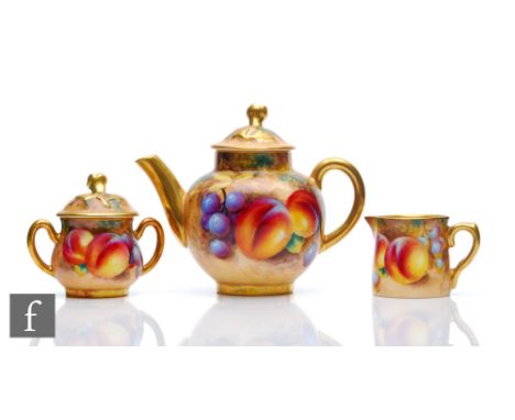 A Royal Worcester Fallen Fruits miniature three piece teaset comprising teapot, milk jug and lidded sugar bowl each decorated