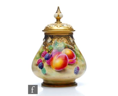 A Royal Worcester Fallen Fruits shape H291 vase with spire cover panel decorated by Owen with hand painted peaches and blackb