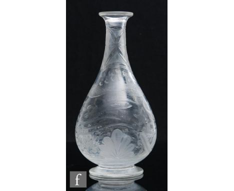 A late 19th Century Stourbridge clear crystal glass decanter, possibly Thomas Webb &amp; Sons, the footed tapered ovoid body 