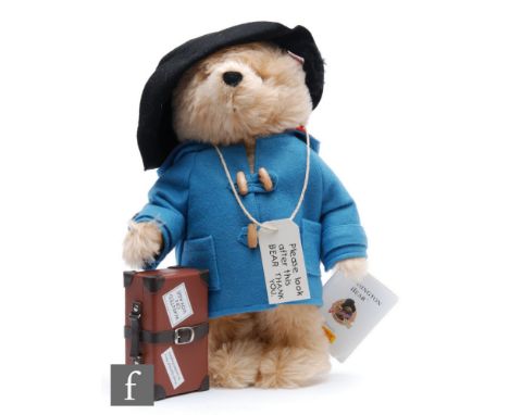 A Steiff 354724 Paddington Bear 50th Anniversary, blonde mohair, wearing jacket and hat and with suitcase, limited edition 59