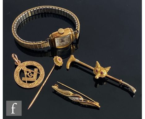 A 9ct fox's head bar brooch, a similar diamond set example, a Masonic fob total and a stick pin, total weight 10.5g, with a 1